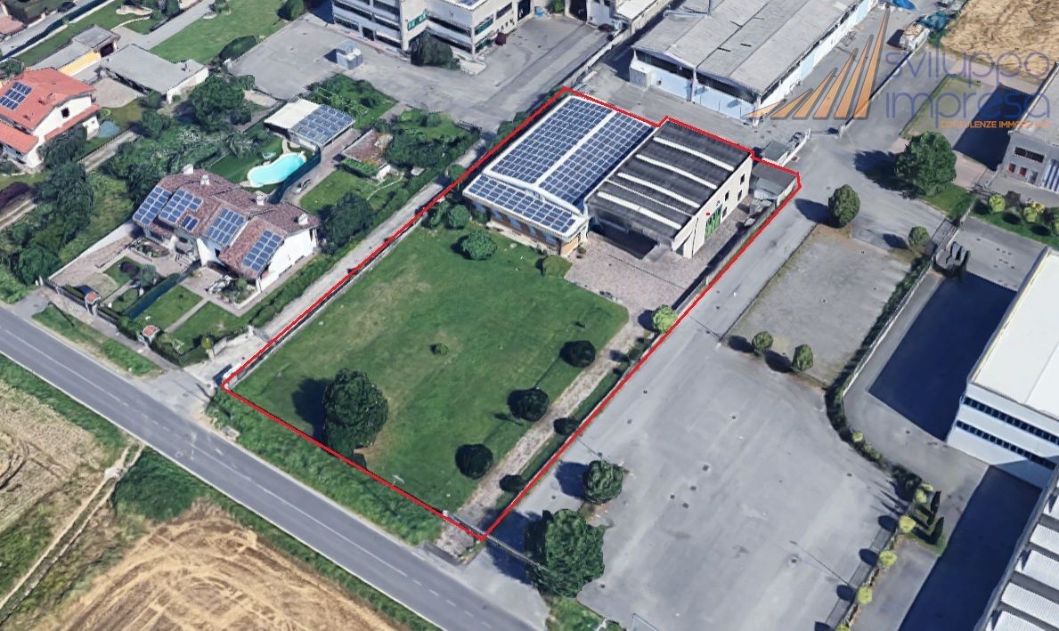 CAPANNONE CON TERRENO EDIFICABILE IN VENDITA A MEZZAGO